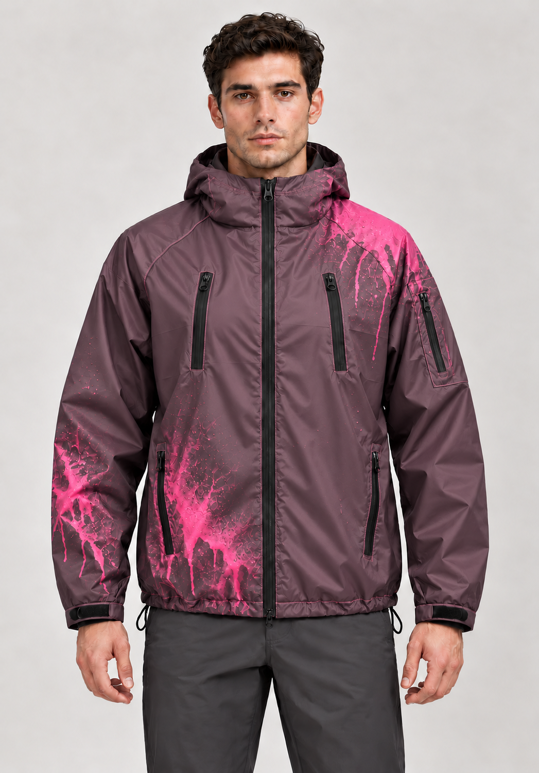 Studio model wearing Black / Pink jacket with localized thermochromic colour reveal